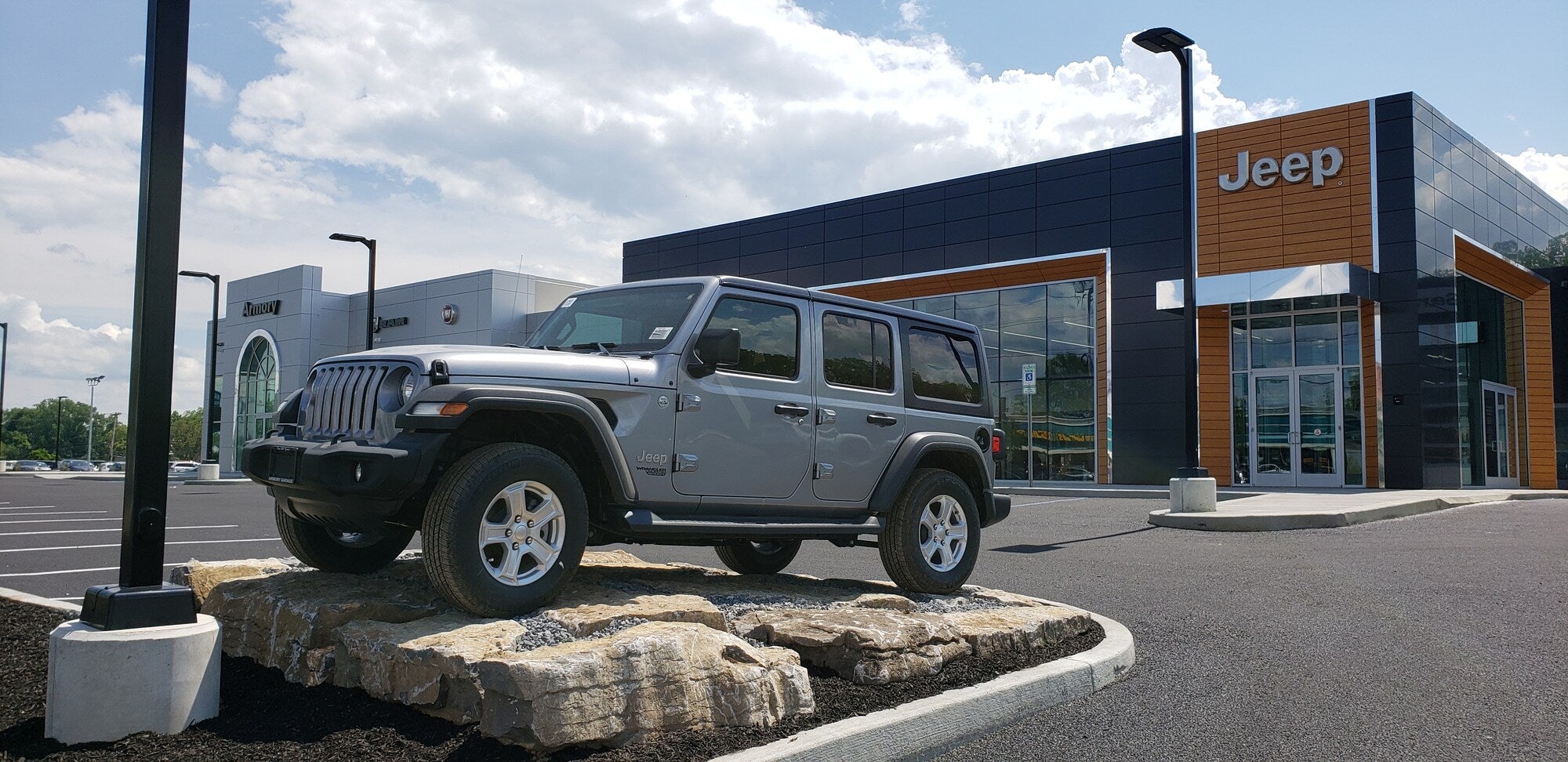 Jeep Wrangler in front of Armory Chrysler Dodge Jeep Ram of Albany.